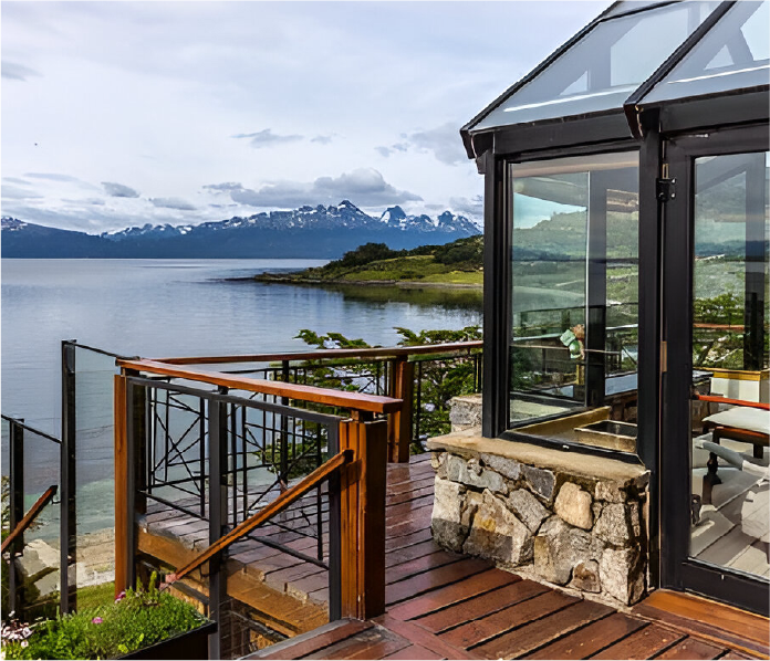 Luxury lodge deck overlooking Patagonian lake and mountains